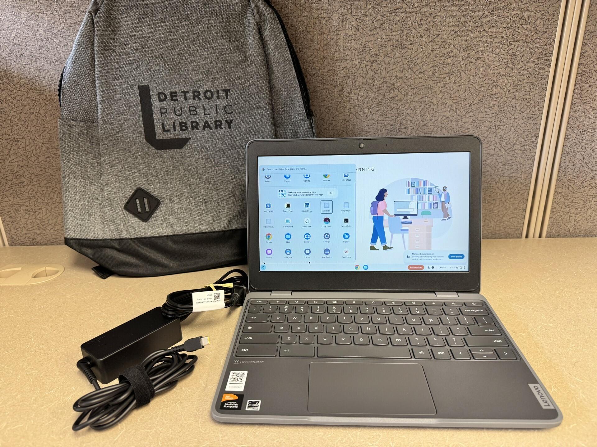 Rentable Chromebook computer with charger and backpack.